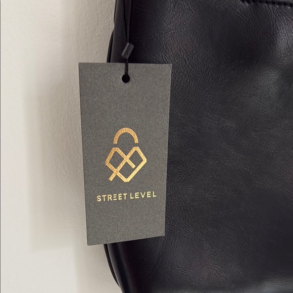 Street Level Black Leather Crossbody Bag with Gold Ring Handle - Picture 2 of 6